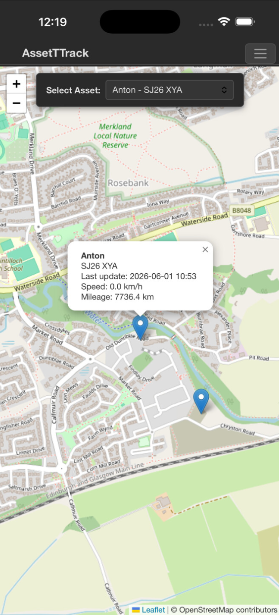 AssetTTrack mobile app showing live vehicle locations